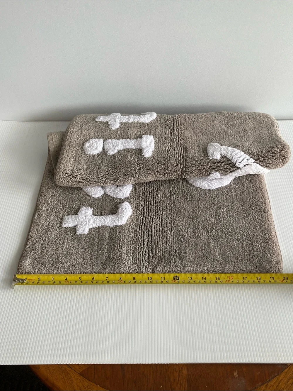 Taupe Bath Rug with White Raised 'take it easy' Text